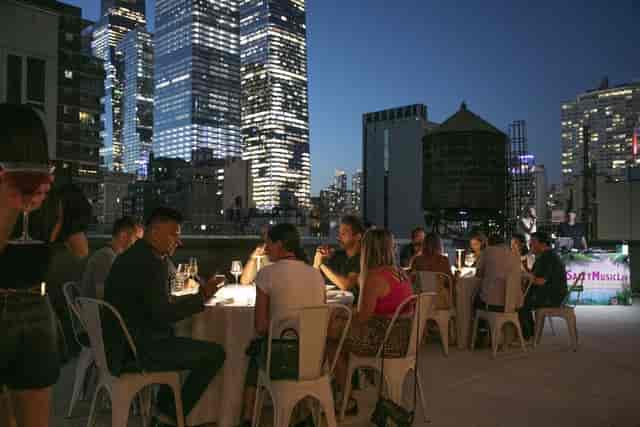 NYC rooftop penthouse reception for intimate corporate networking events.