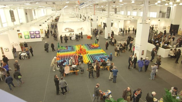 Industrial exhibition hall at Pier 36 NYC for trade shows and gallery events.