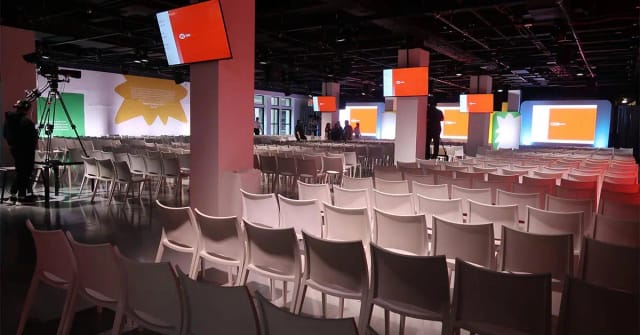 Center415 Exhibition Hall theater setup with AV screens for corporate events and conferences.