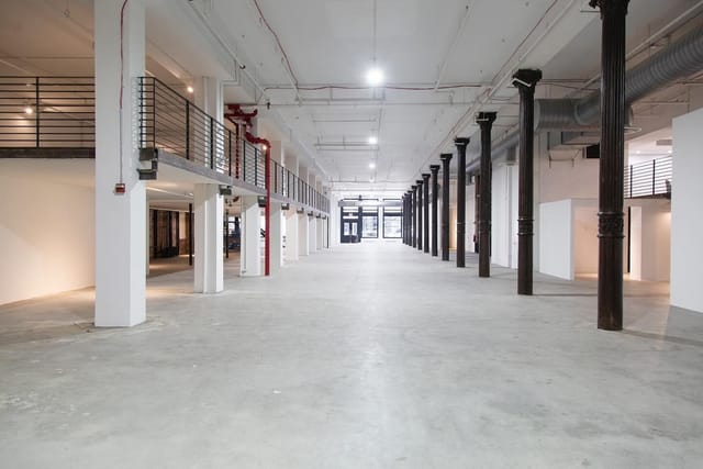 Industrial-chic Exhibition Hall South venue for corporate events and product launches.