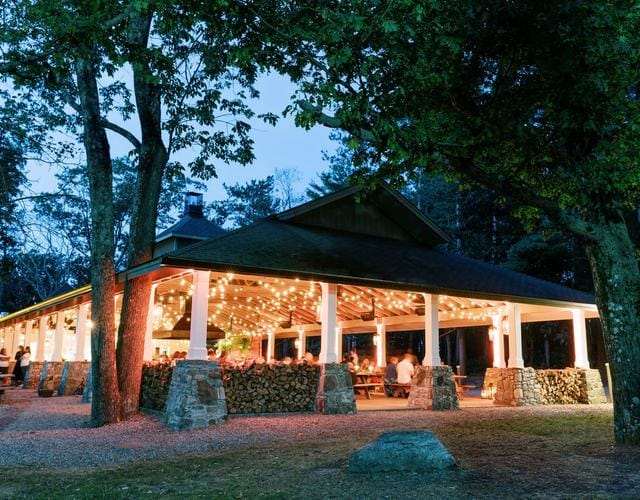 Rustic Pavilion venue at Cedar Lakes Estate with string lighting for corporate events and receptions.