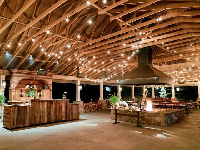 Barn Patio at Cedar Lakes Estate: Rustic venue with timber ceiling for networking or rehearsals.