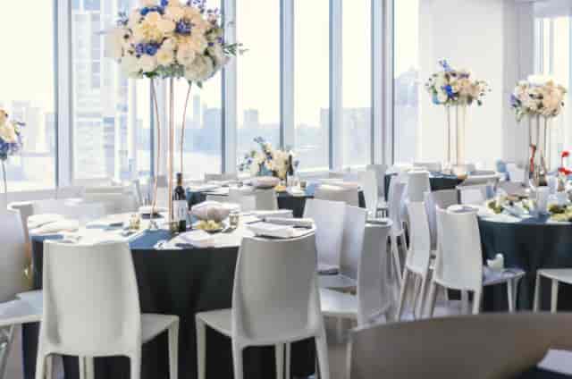 Sophisticated GH Venues terrace event setup with skyline views, ideal for weddings and gala dinners.