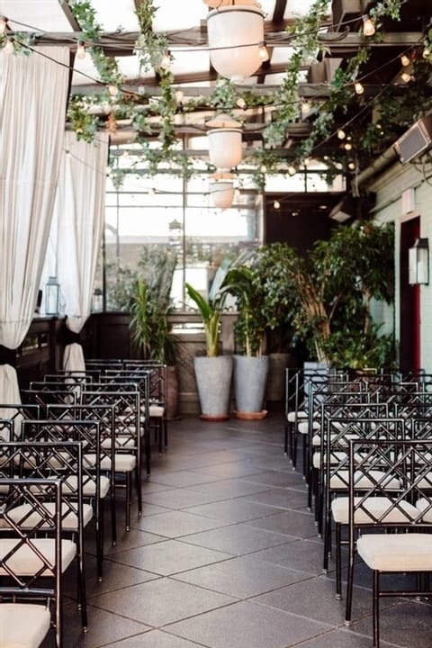 Elegant GH Venues terrace with bamboo seating for boutique weddings and corporate events.