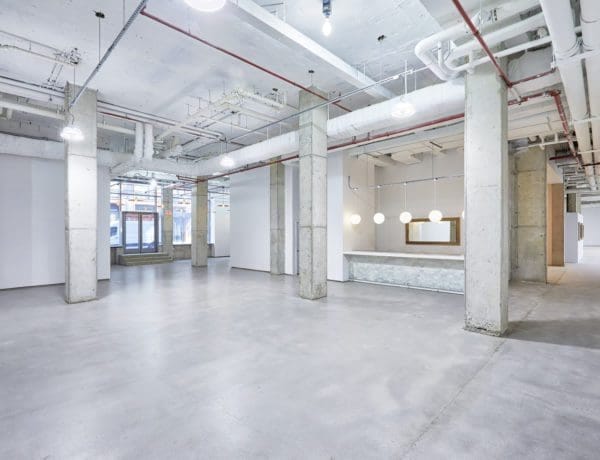 Industrial Chelsea gallery venue with concrete floors for brand activations and corporate events.