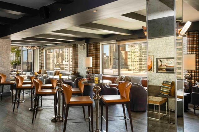 Upscale lounge at The Empire Hotel with city views, perfect for cocktail receptions and networking.