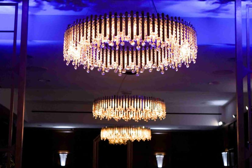 Crystal chandeliers in Hotel Belleclaire restaurant for upscale gala and formal reception.