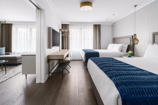 Sterling Room suite at The Wallace with lounge area for executive lodging and VIP meetings.