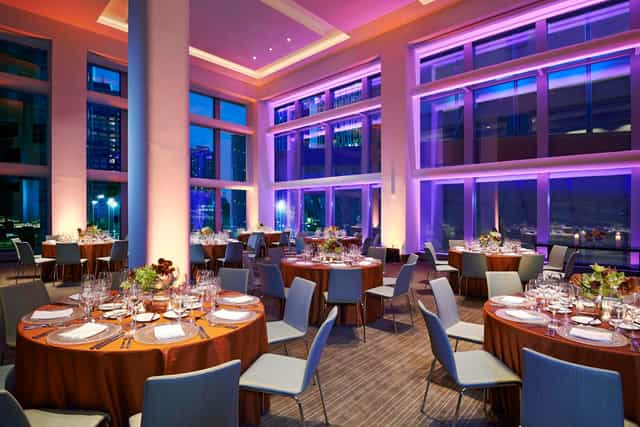 Conrad Downtown event room with purple LED lighting for corporate galas and banquet functions.