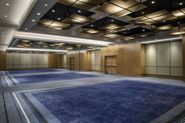 Conrad New York Downtown ballroom with high ceilings, ideal for corporate events and trade shows.