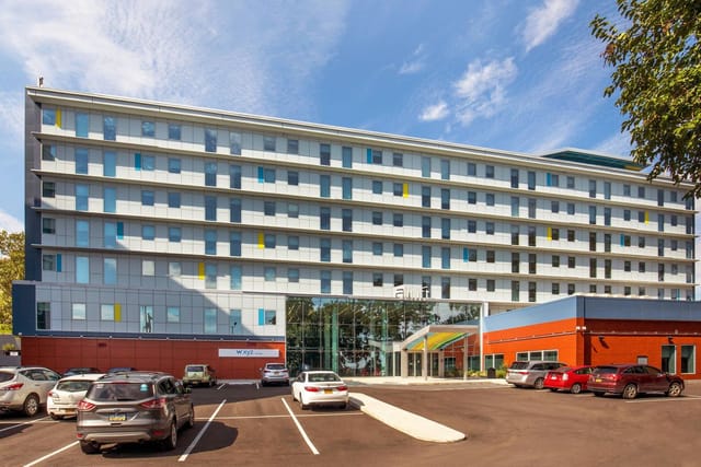 Modern New York LaGuardia Airport Marriott hotel with parking for corporate meetings and training.