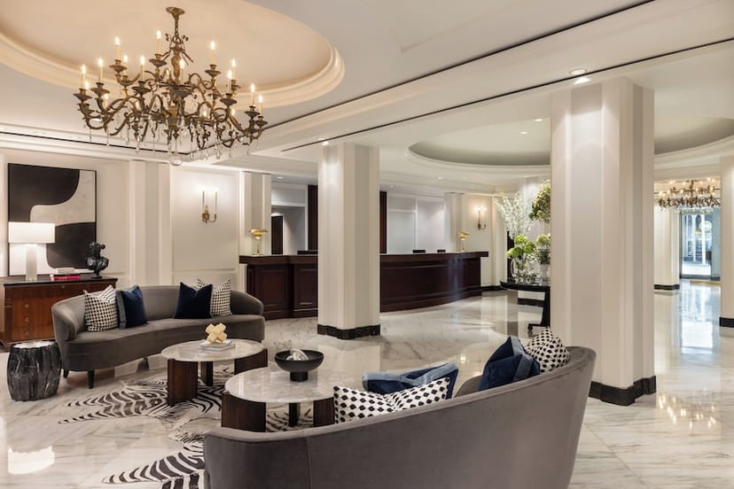Omni Berkshire Place hotel lobby, sophisticated VIP registration area for corporate events.