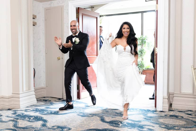 Event planner creating a grand entrance for a luxury wedding reception in Marina Del Rey.