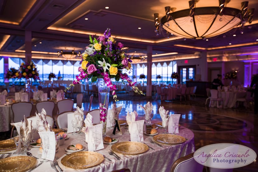 Gala dinner setup with gold chargers and floral centerpieces for Marina Del Rey event venue.