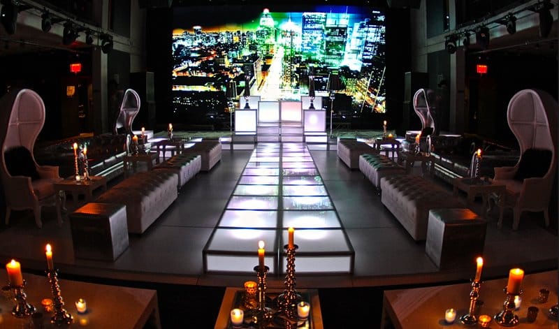 Modern Melrose Ballroom stage with LED backdrop, ideal for corporate galas and fashion shows.