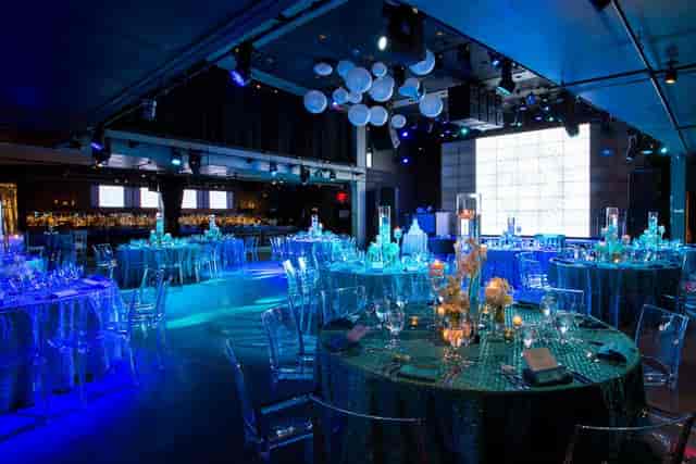 Modern Melrose Ballroom event space with blue lighting, perfect for gala or corporate reception.