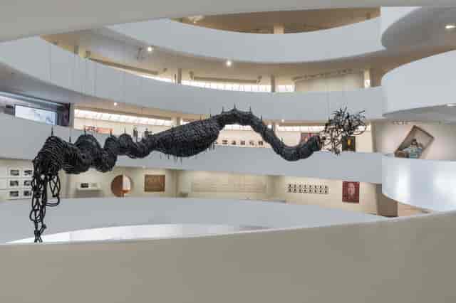 Guggenheim Museum exhibition space with iconic spiral ramp for corporate events and gala venue.