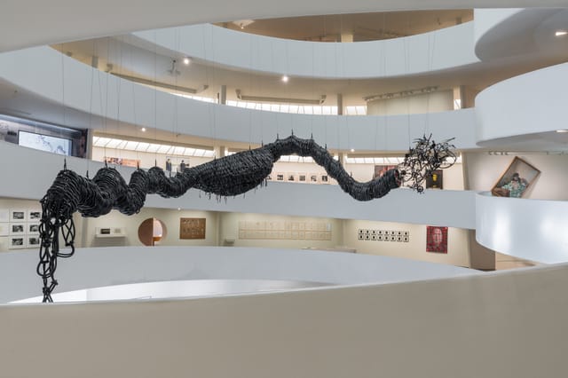 Guggenheim Museum exhibition space with iconic spiral ramp for corporate events and gala venue.