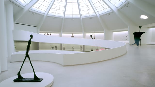 Guggenheim Museum rotunda exhibition space for corporate gala and evening reception venue.