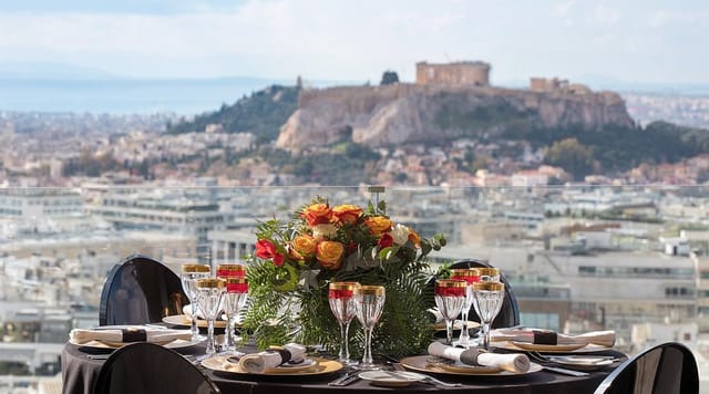 La Suite Lounge at St. George Lycabettus with panoramic Acropolis view for luxury executive dining.