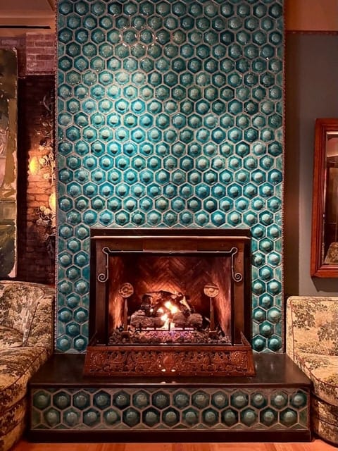 Blue Room at Nine Orchard with velvet seating for intimate networking and VIP event spaces.