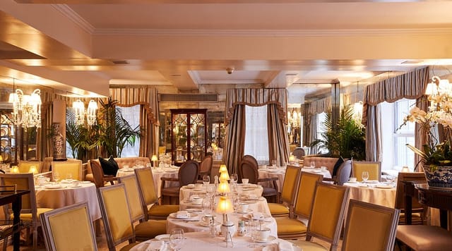 Pembroke Room banquet space set for an intimate corporate luncheon or VIP dinner.