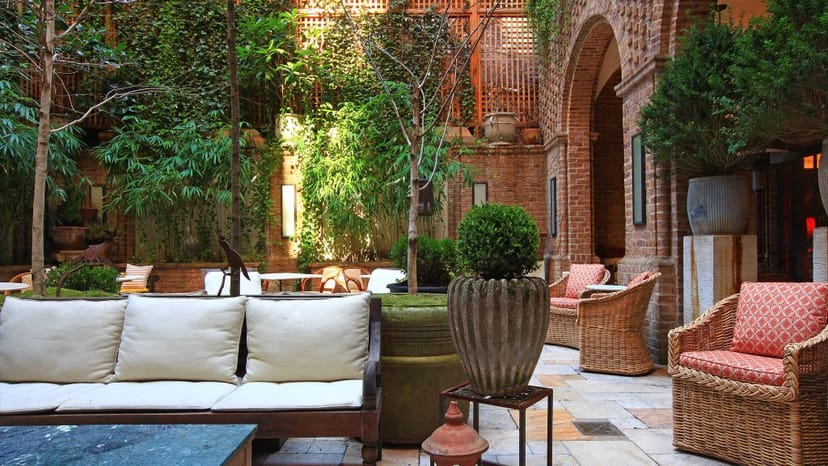 Greenwich Hotel courtyard: lush VIP cocktail reception and high-end networking event space.