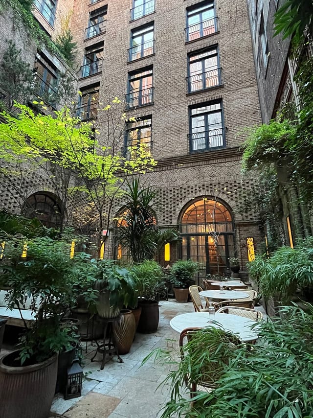 The Greenwich Hotel courtyard: lush VIP reception and boutique networking event venue.