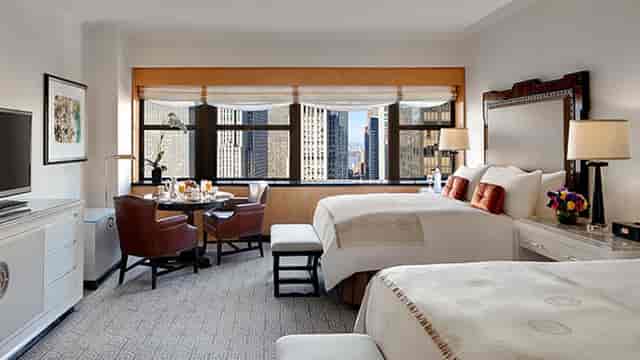 Luxury guest room at Lotte New York Palace for executive travel and corporate business meetings.