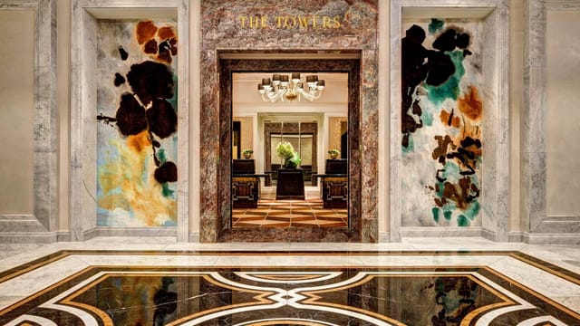 Luxury Lotte New York Palace entrance for executive retreats and VIP events.