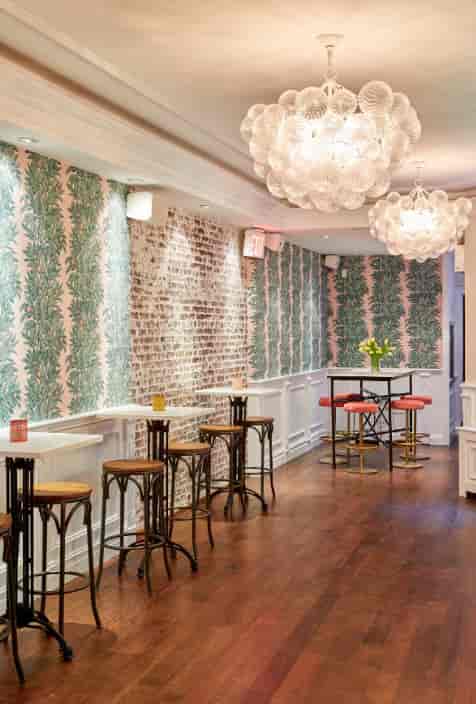 High-top seating at All & Sundry, an intimate boutique venue for cocktail receptions and networking.