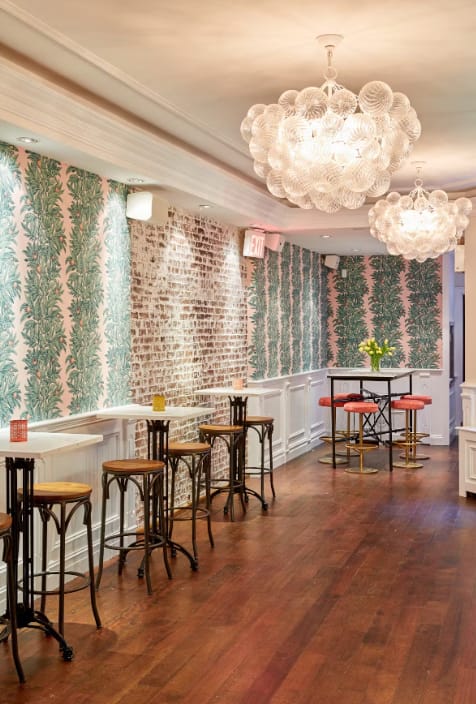 High-top seating at All & Sundry, an intimate boutique venue for cocktail receptions and networking.