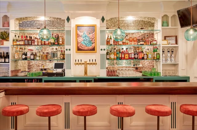 Upscale bar at All & Sundry, elegant counter for networking and cocktail reception events.