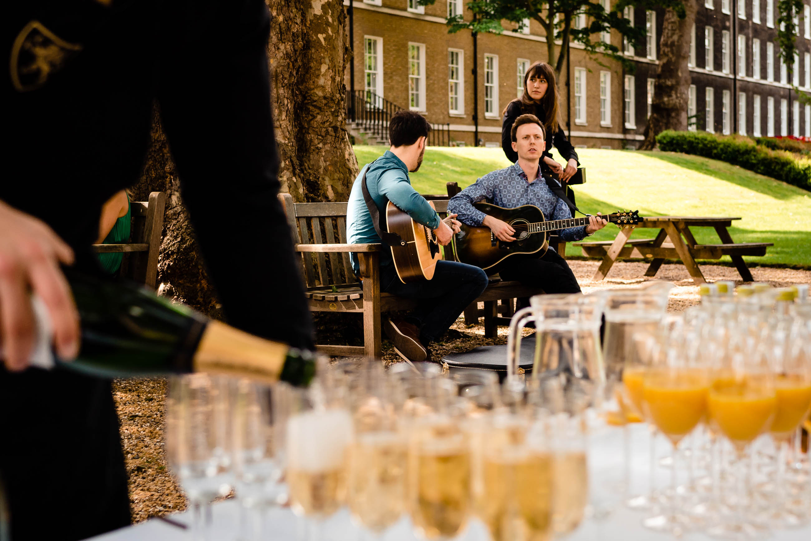 Outdoor summer party setup with live music at Gray's Inn, ideal for networking events. - Banner
