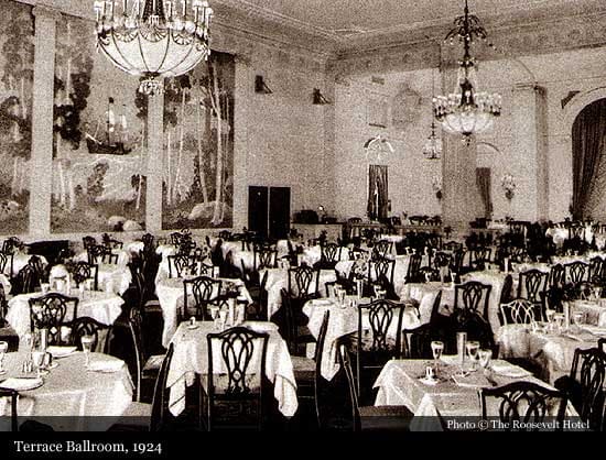 Roosevelt Hotel ballroom with ornate chandeliers set for a formal banquet and wedding event.