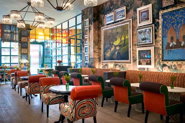 Warren Street Hotel lobby with vibrant decor for intimate networking lunch and breakout sessions.