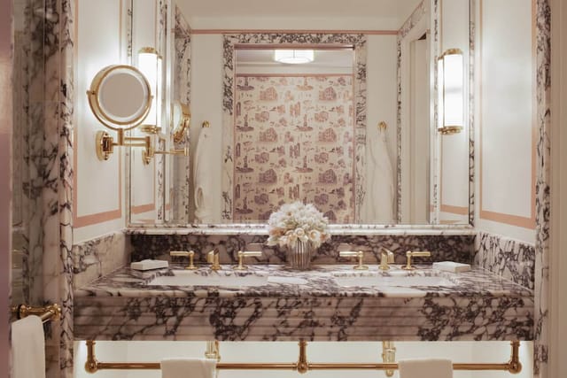 Luxury marble restroom at Fouquet's New York, ideal for VIP events and upscale venue rentals.