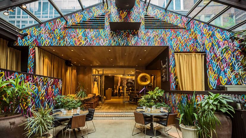 NoMo Kitchen mural atrium venue for corporate mixers and creative networking events.