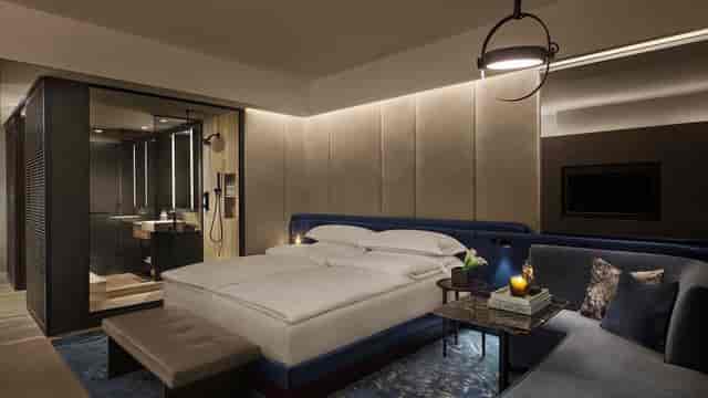 Equinox Hotel luxury suite with ambient lighting for VIP accommodations and executive travel.