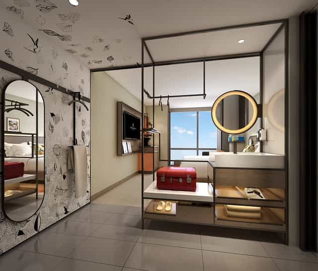 Modern hotel guest room at Renaissance Flushing, ideal for business travel and corporate stays.