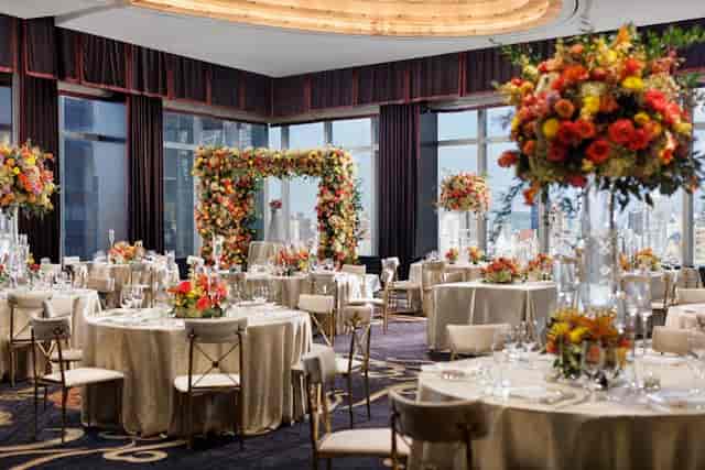 Luxury ballroom event setup at Mandarin Oriental New York for wedding reception or corporate gala.