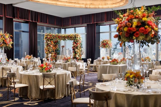 Luxury ballroom event setup at Mandarin Oriental New York for wedding reception or corporate gala.