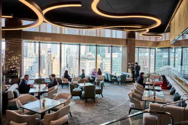 Luxury VIP lounge at Mandarin Oriental NYC with city views, perfect for executive networking events.