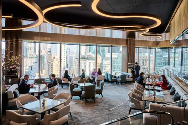 Luxury VIP lounge at Mandarin Oriental NYC with city views, perfect for executive networking events.