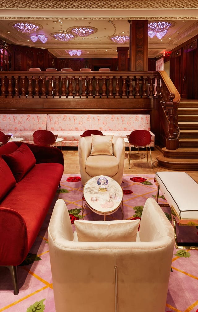 Rose Club at The Plaza: Eclectic lounge seating for luxury corporate retreat networking.