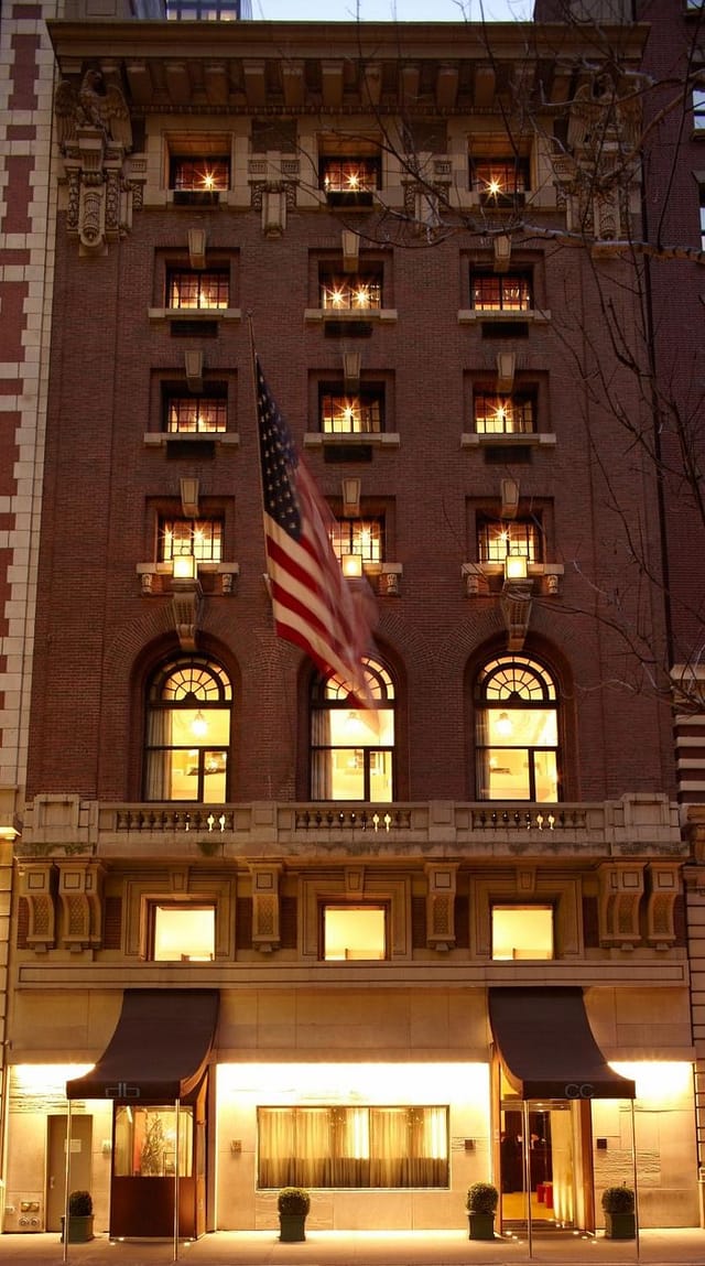 Historic City Club Hotel exterior at dusk, ideal for executive meetings and gala events.