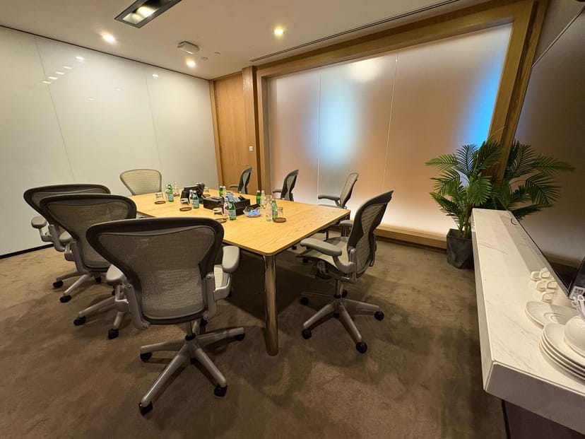 Modern boardroom setup in Marina Bay Financial Centre for executive strategy and corporate meetings.