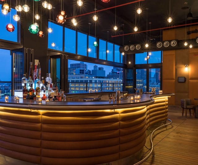 Hotel Hugo rooftop bar for corporate networking and cocktail events with NYC skyline views.