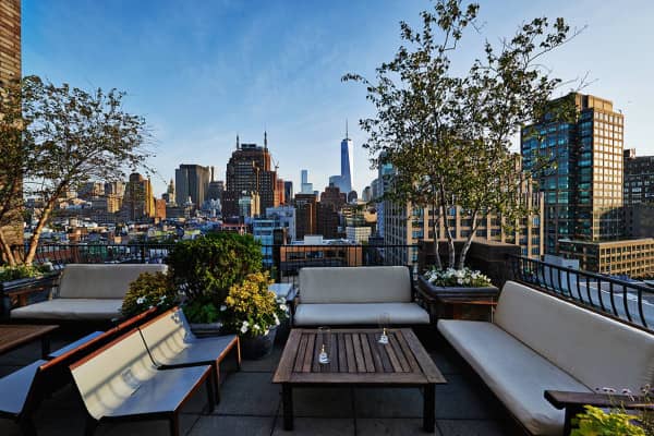 Rooftop bar at SIXTY SoHo, NYC: Luxury networking reception and product launch event venue.
