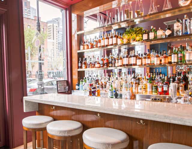 Alcove Bar & Lounge NYC: Upscale venue for intimate corporate receptions and VIP networking events.